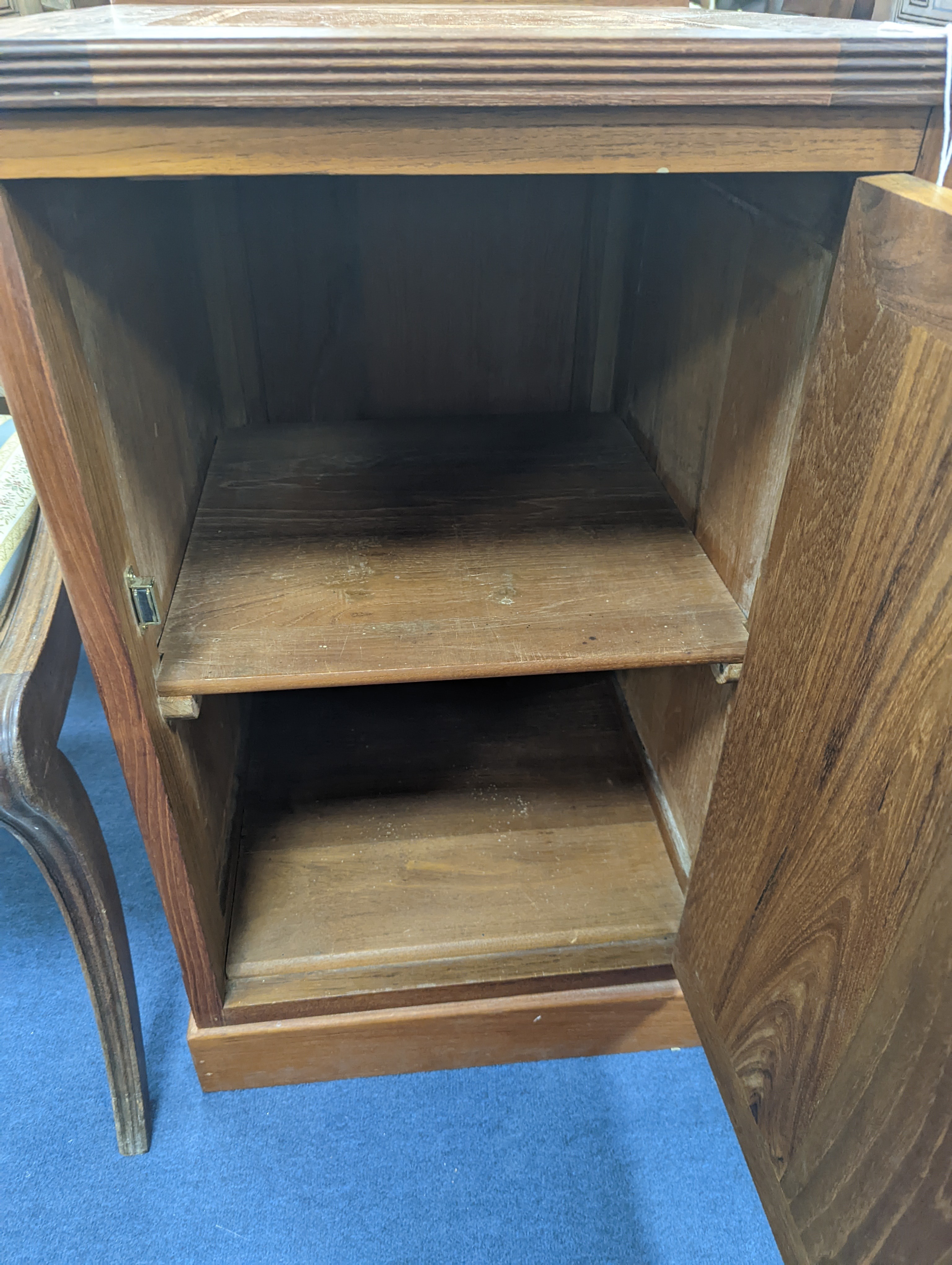 A pair of Chinese solid teak marble topped single door cupboards, width 48cm, depth 51cm, height 83cm